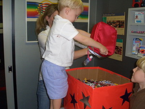 photo of children donating their halloween candy to one of our charities